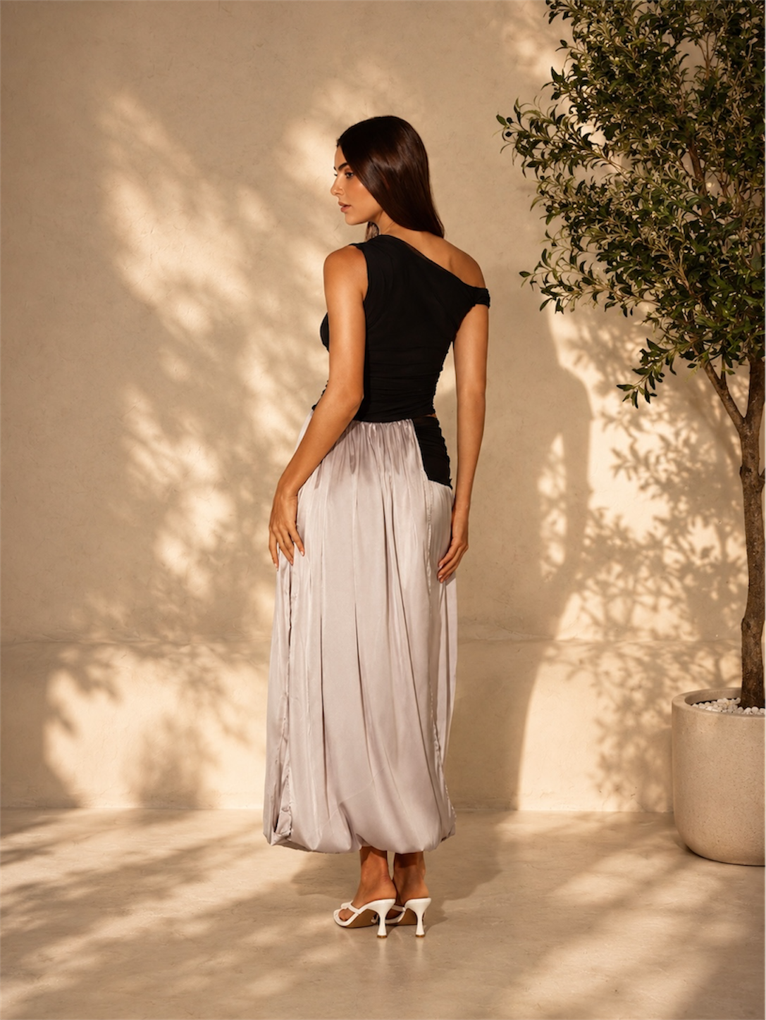 Fraeya Obsidian dress featuring statement eveningwear and contemporary feminine styling designed in Dubai