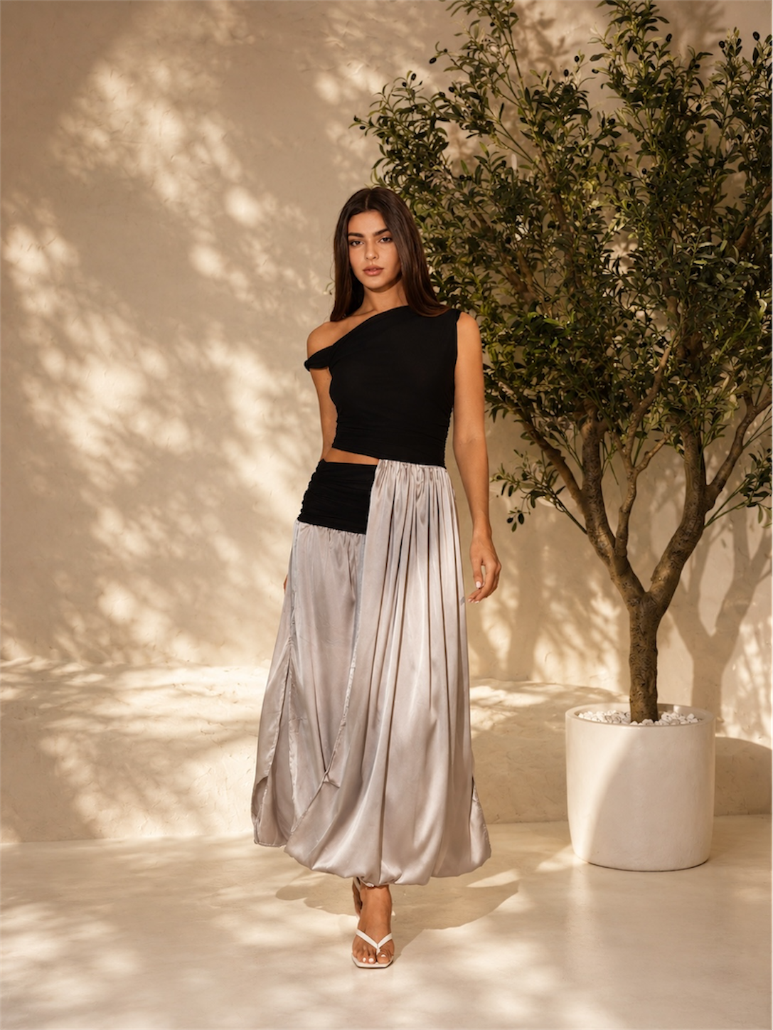 Fraeya Obsidian dress featuring statement eveningwear and contemporary feminine styling designed in Dubai