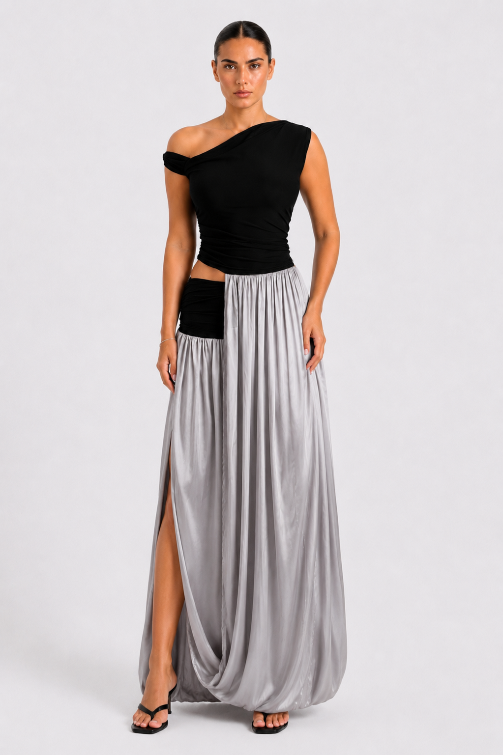 Fraeya Obsidian dress featuring statement eveningwear and contemporary feminine styling designed in Dubai